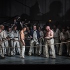 Roderick Williams (Billy Budd),, Eddie Wade (Donald), Daniel Norman (Red Whiskers) and members of the cast and chorus